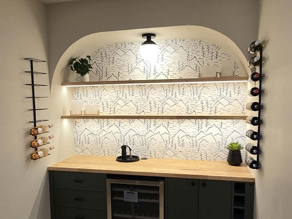 Finish product with slab countertop and wine racks mounted.